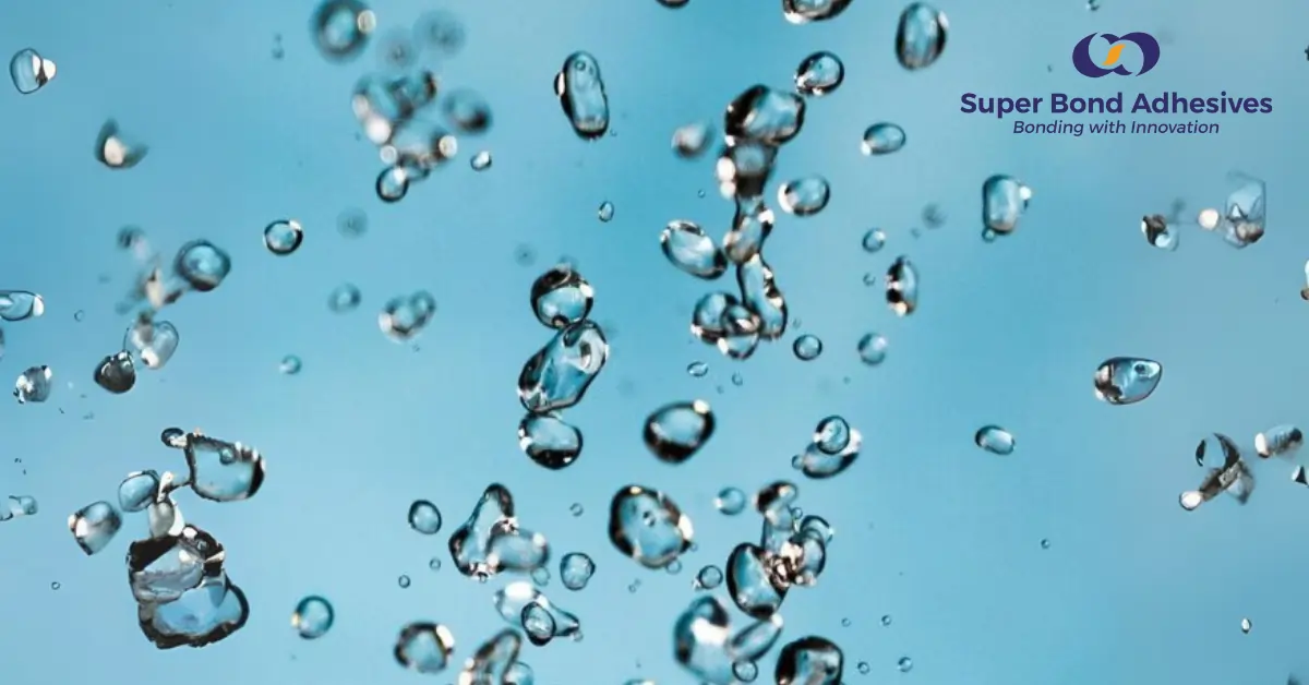 Close-up of suspended water droplets representing water-based adhesive dispersion.