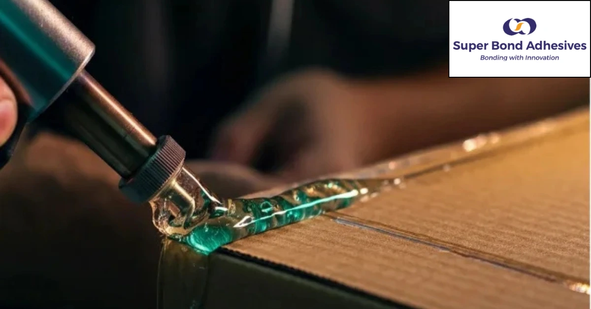HMPSA Adhesive being applied by a glue gun